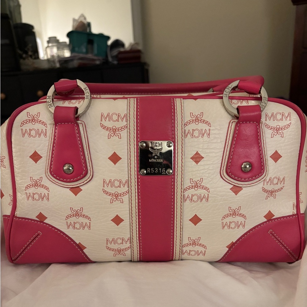 MCM pink and white leather handbag. COA provided